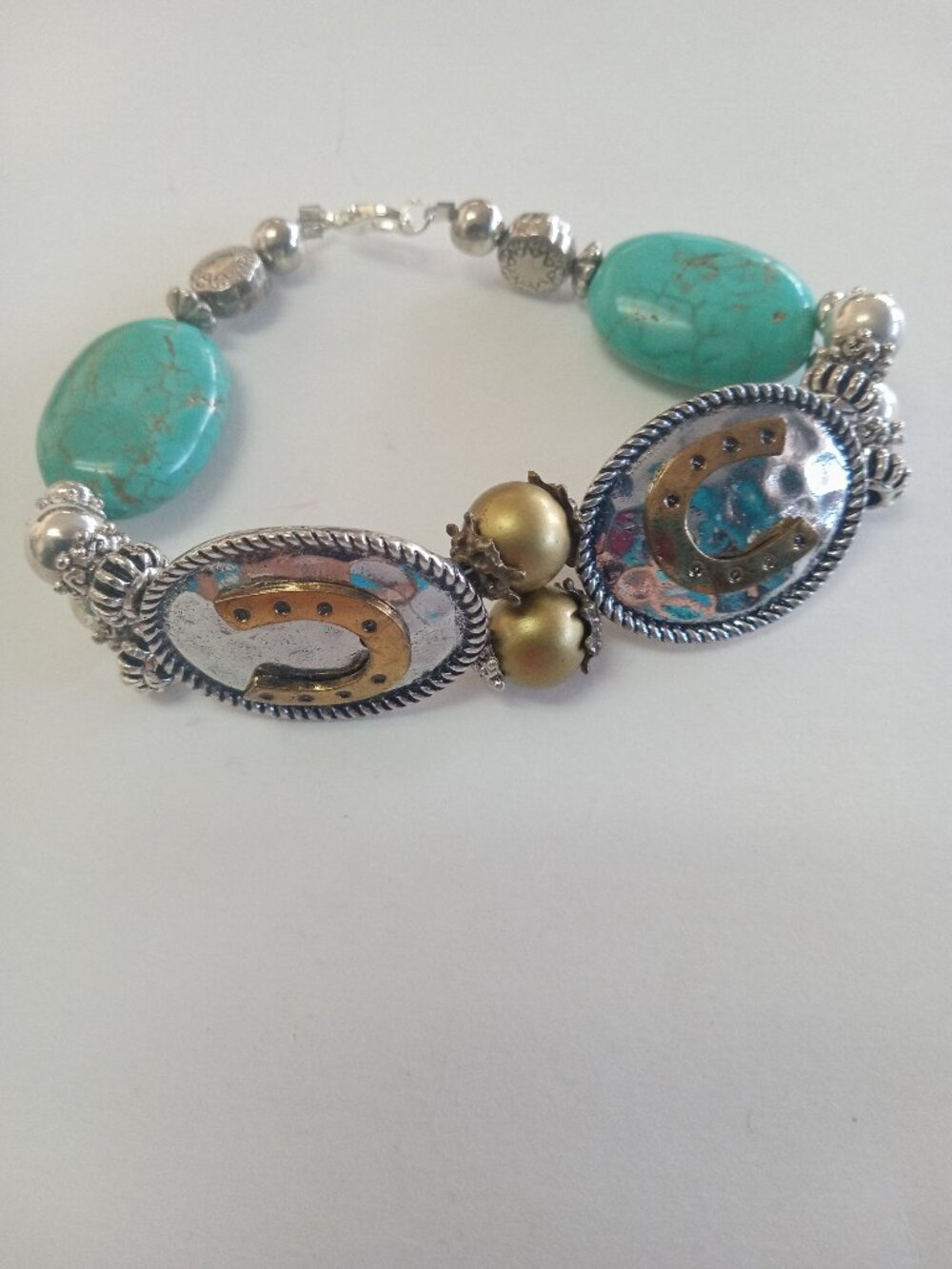 Silver-Tone Slip-On Horseshoe Bracelet w/Teal cracked Aztec-Style Stone-omg1011